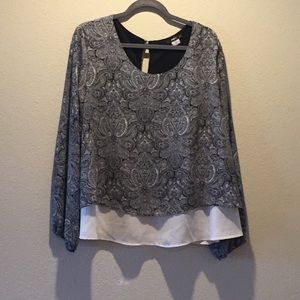 2 shirts, mirror images of each other!